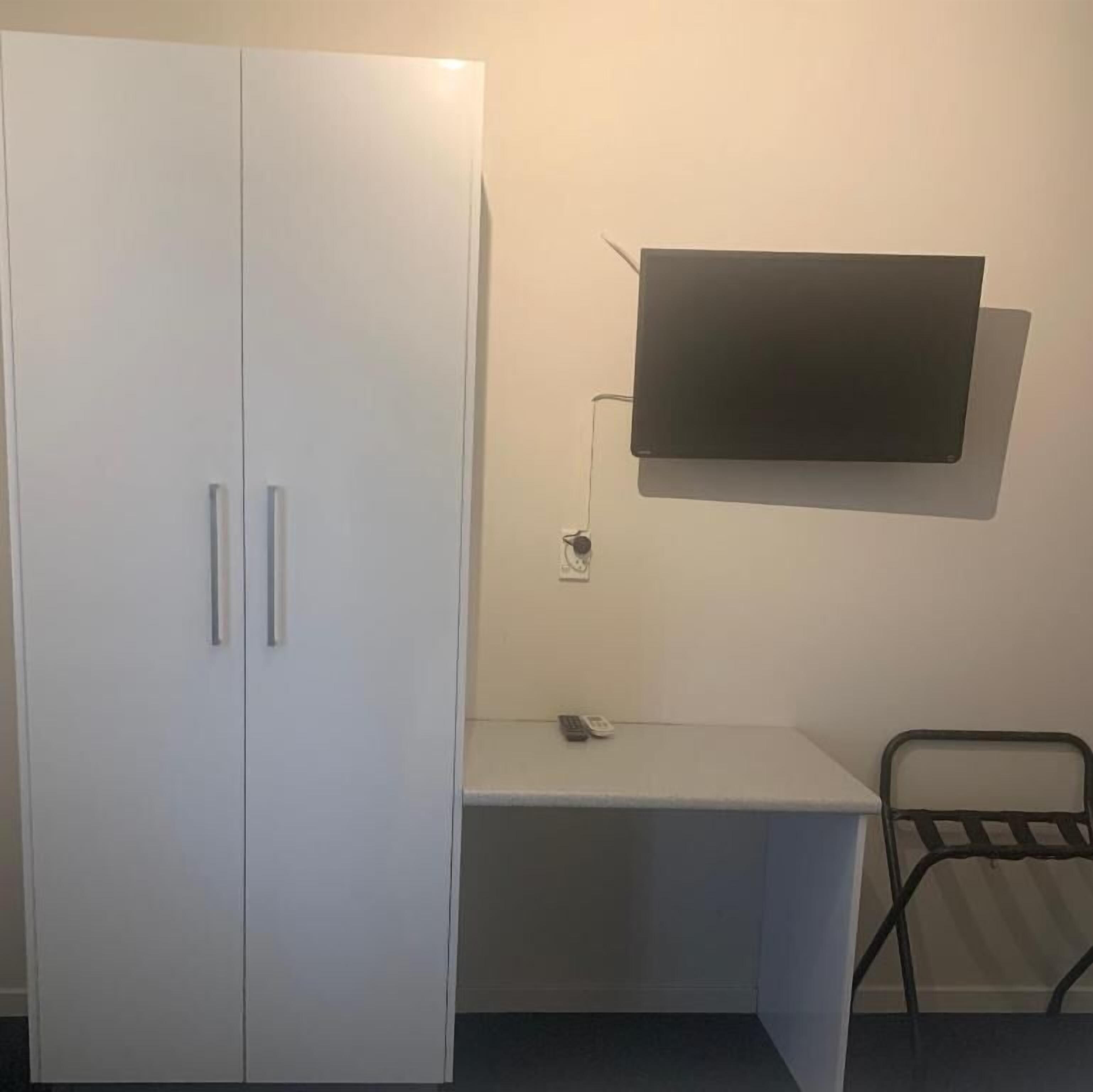 Desk, iron/ironing board, free WiFi, bed sheets