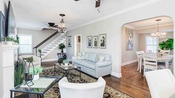 Smart TV, fireplace, books, offices