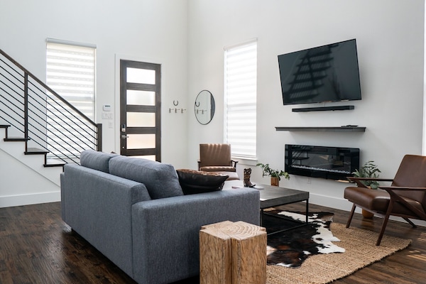 As you enter, you are greeted by the stylish living room.