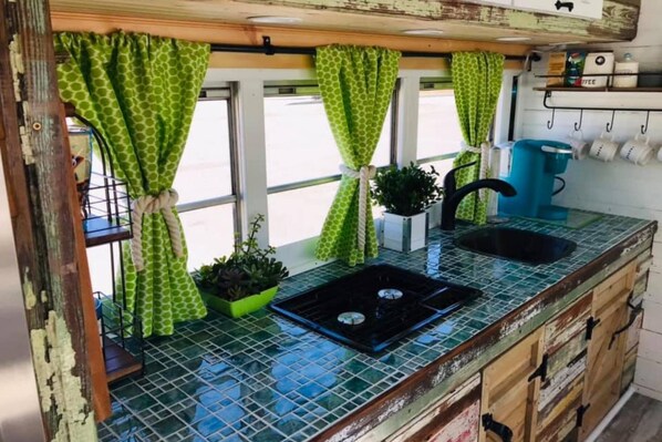 Fridge, microwave, stovetop, coffee/tea maker