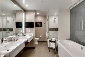 Bathtub, hair dryer, towels, soap
