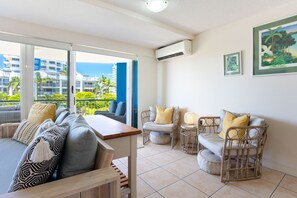 Premium Apartment, 2 Bedrooms, Beachside | Living area | 55-inch Smart TV with digital channels, TV, DVD player - Coral Sea Apartments (Maroochydore)