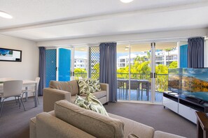 55-inch Smart TV with digital channels, TV, DVD player - Coral Sea Apartments (Maroochydore)