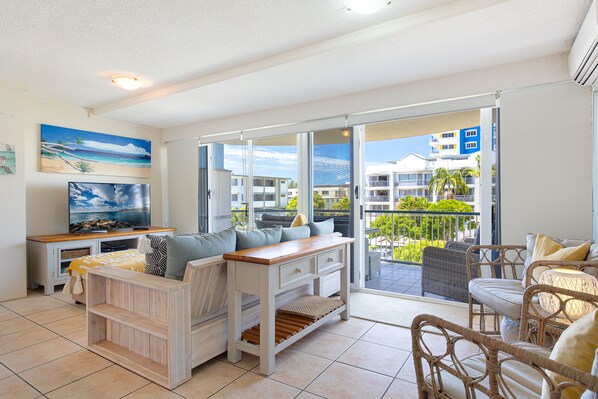 Premium Apartment, 2 Bedrooms, Beachside | Living area | 55-inch Smart TV with digital channels, TV, DVD player - Coral Sea Apartments (Maroochydore)