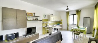 Villa Olga A: A cozy and welcoming apartment that is part of a villa situated in a quiet location, a few minutes from the town center, with Free WI-FI.