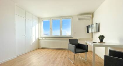 Modern + spacious room with shared kitchen and shared bathroom
