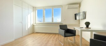 Modern + spacious room with shared kitchen and shared bathroom