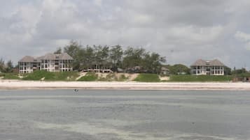On the beach, white sand, beach towels