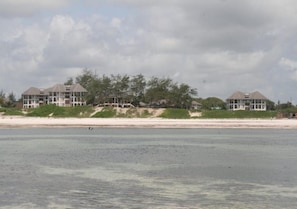 On the beach, white sand, beach towels