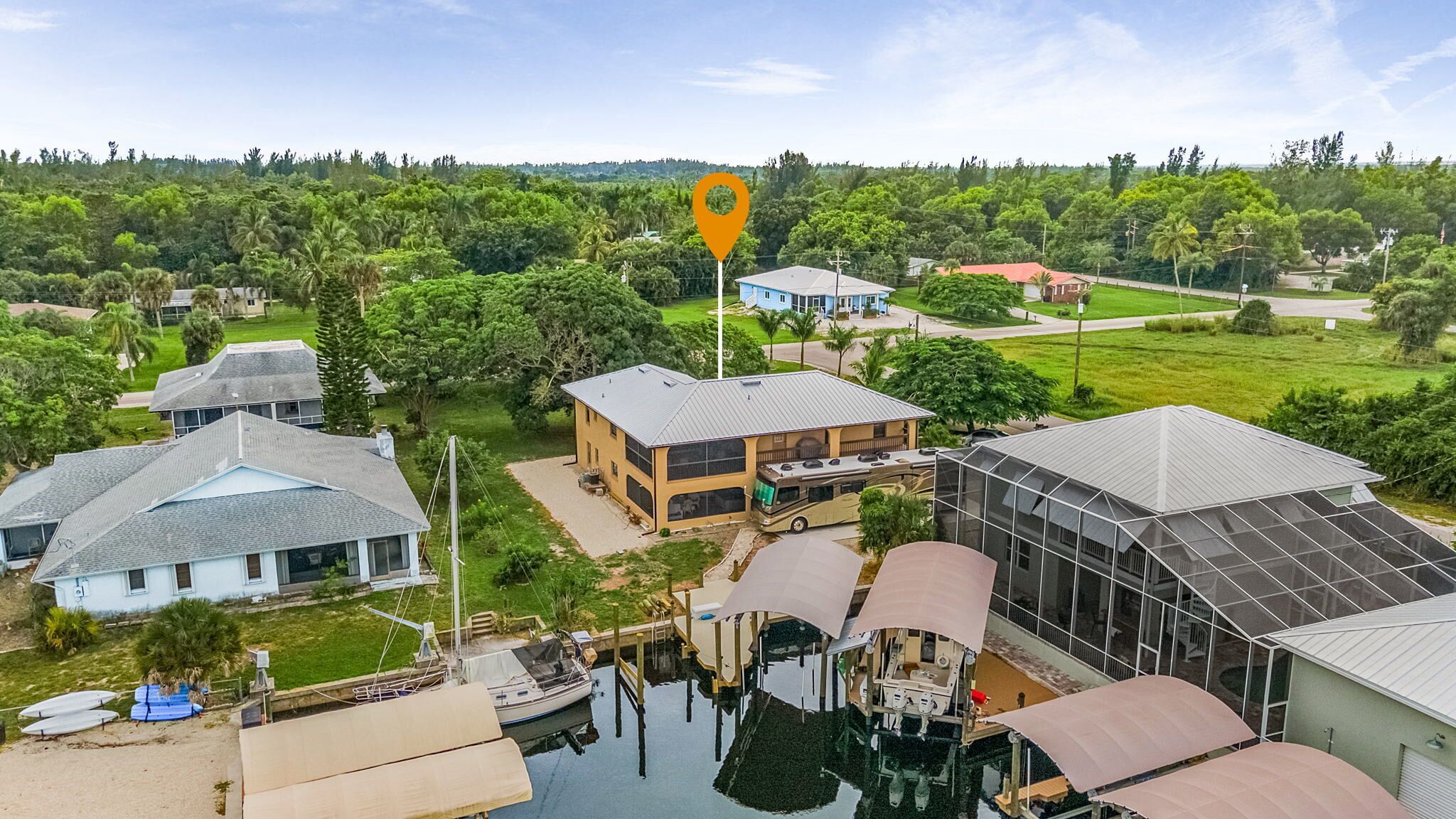 3/2 in Bokeelia with INCREDIBLE GULF ACCESS, BOAT SLIP INCLUDED! ​​​​​​​Spacious upstairs unit with amazing porch overlooking canal! 