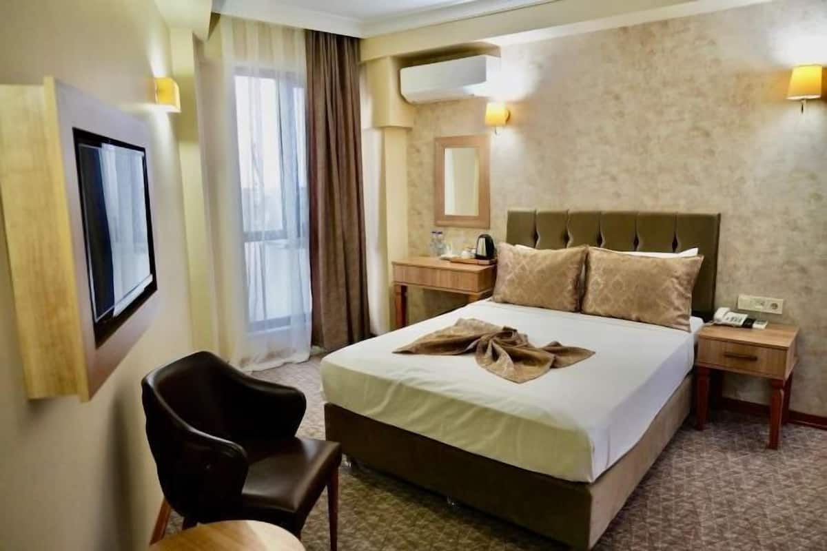 Hypo-allergenic bedding available, memory foam beds, minibar