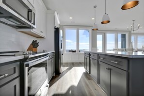 Fridge, microwave, oven, stovetop - Family Time: Oceanfront in Oak Island: 5BR, 4BA, sleeps 14 with private pool. (Oak Island)