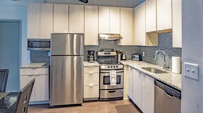 Apartment, 2 Bedrooms | Private kitchen | Fridge, oven, coffee/tea maker, toaster
