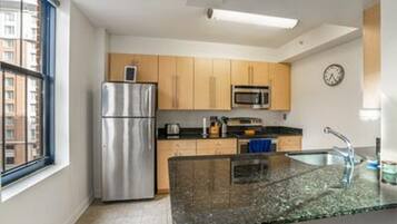 Apartment, 2 Bedrooms | Private kitchen | Fridge, oven, coffee/tea maker, toaster