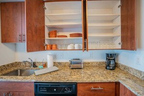 Apartment, 2 Bedrooms | Private kitchen | Fridge, dishwasher, coffee/tea maker, toaster
