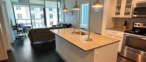 Apartment, 2 Bedrooms | Private kitchen | Fridge, oven, coffee/tea maker, toaster