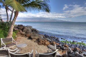 On the beach, sun loungers, beach towels