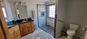 Bathtub, towels, soap, shampoo