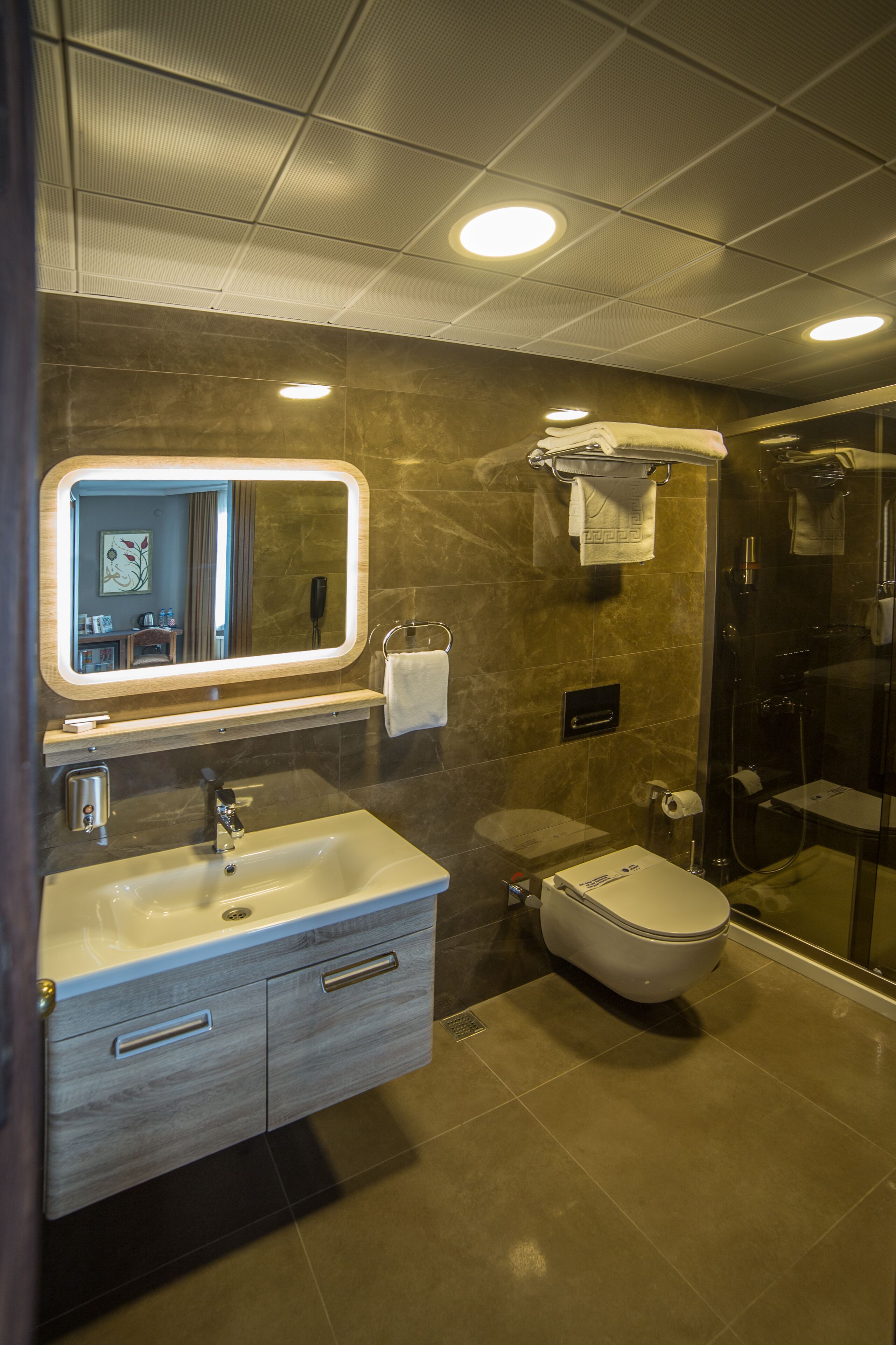 Junior Suite, 1 King Bed, Sea View | Bathroom | Shower, rainfall showerhead, hair dryer, slippers