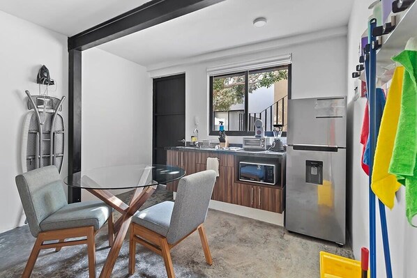 Fridge, microwave, stovetop, coffee/tea maker