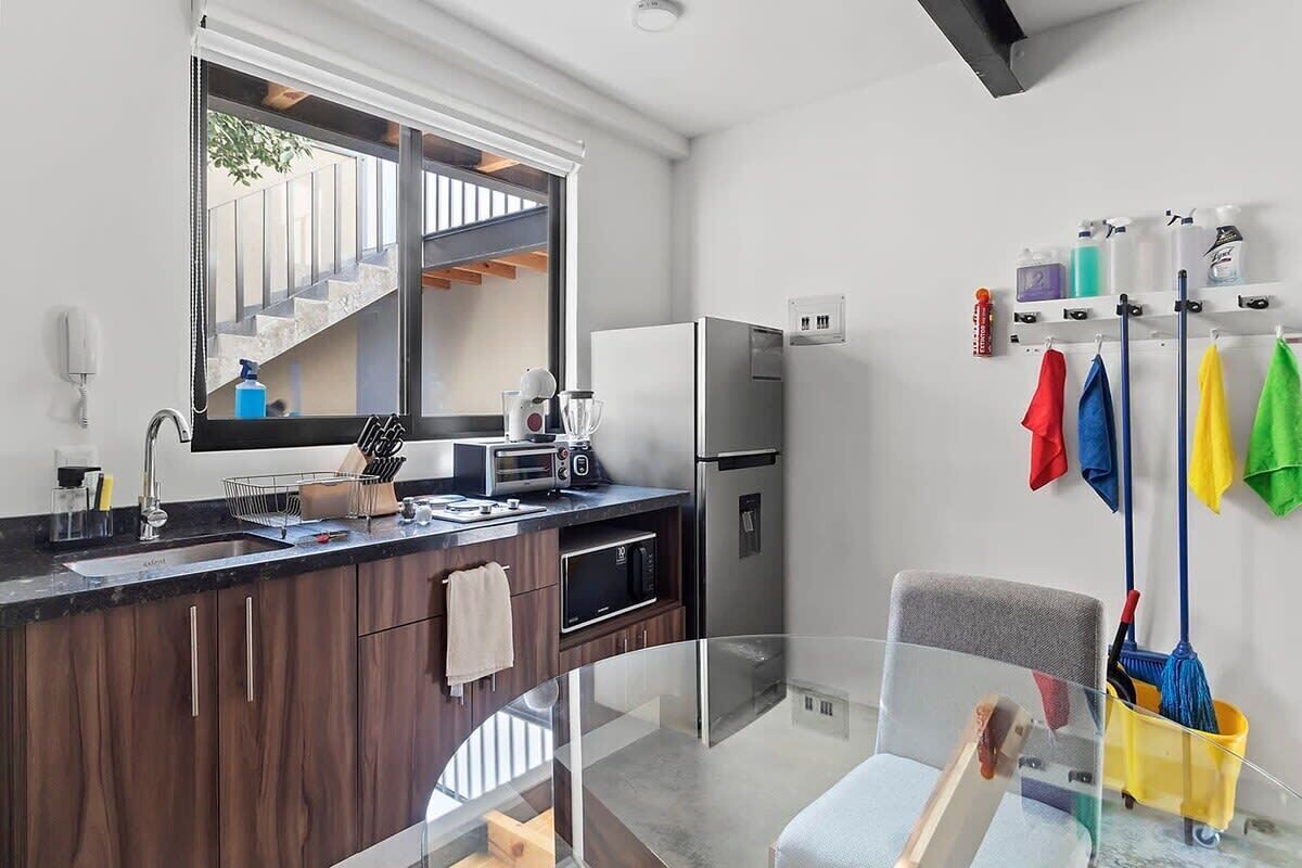 Fridge, microwave, stovetop, coffee/tea maker