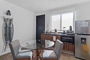 Fridge, microwave, stovetop, coffee/tea maker