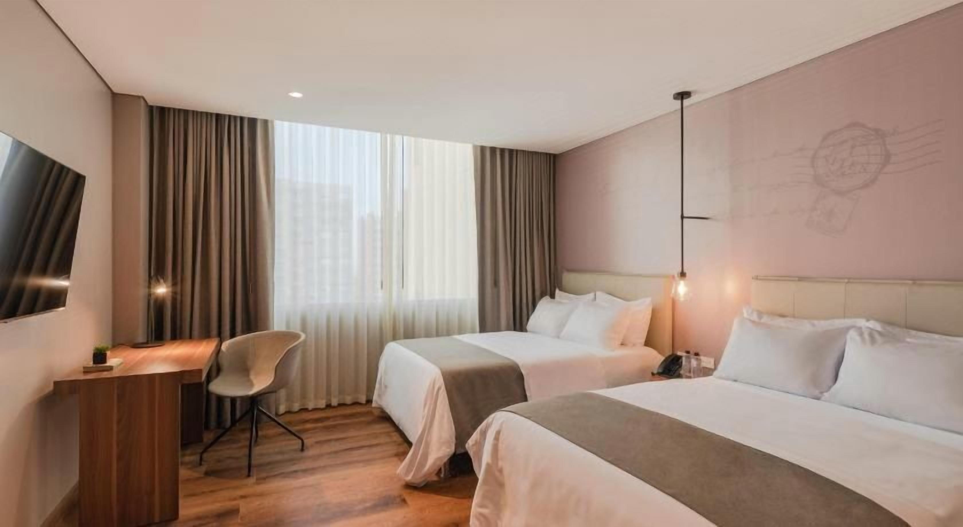 Hypo-allergenic bedding, pillowtop beds, minibar, blackout drapes