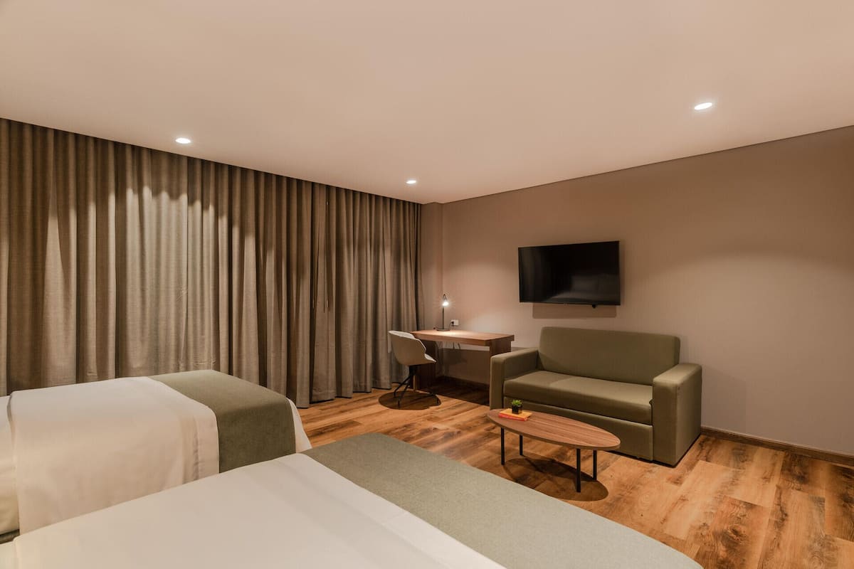 Allergitestade sÀngklÀder, bÀddmadrasser och minibar