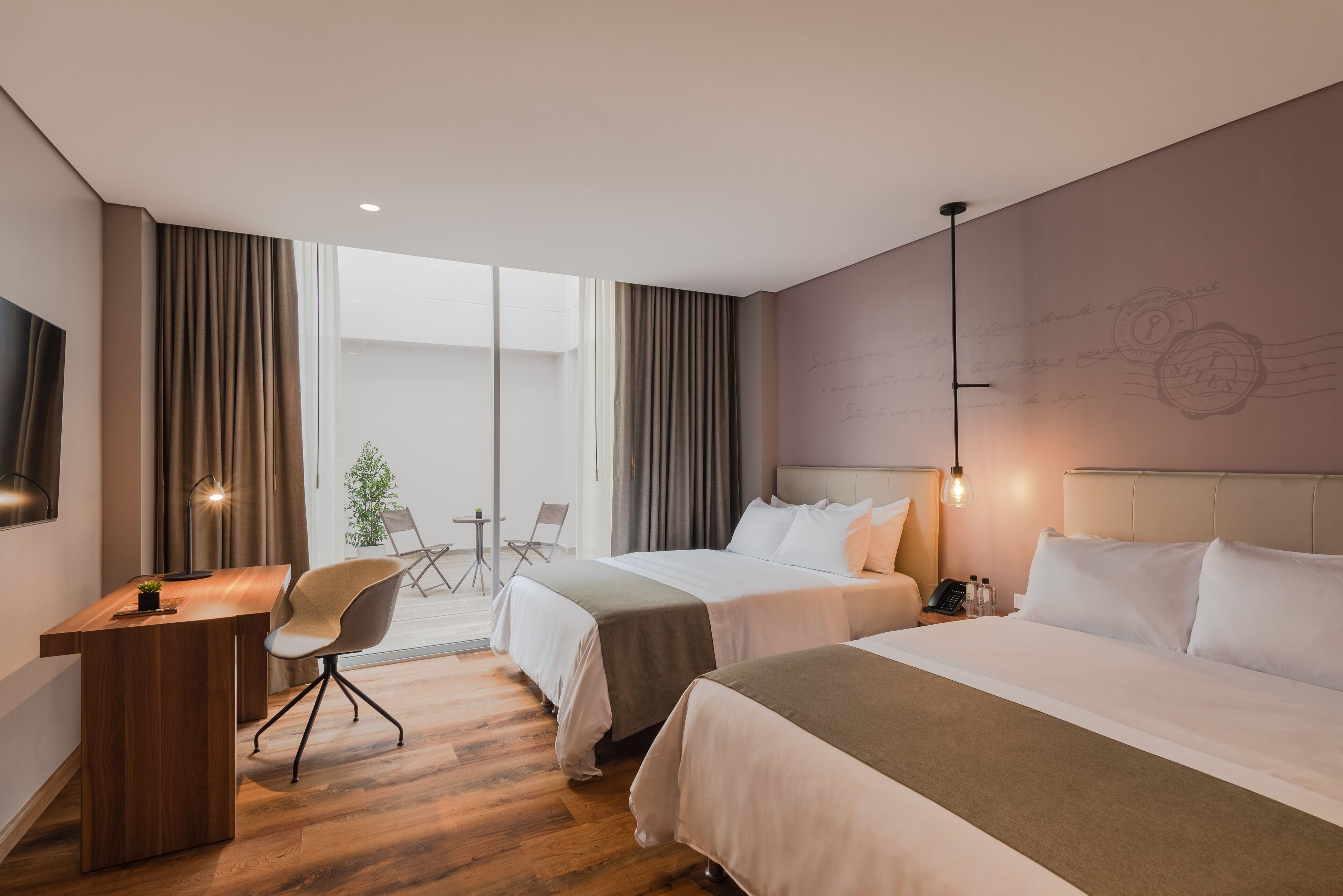 Hypo-allergenic bedding, pillowtop beds, minibar, blackout drapes