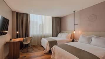 Hypo-allergenic bedding, pillowtop beds, minibar, in-room safe