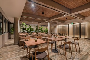 Breakfast, lunch served; local and international cuisine, pool views