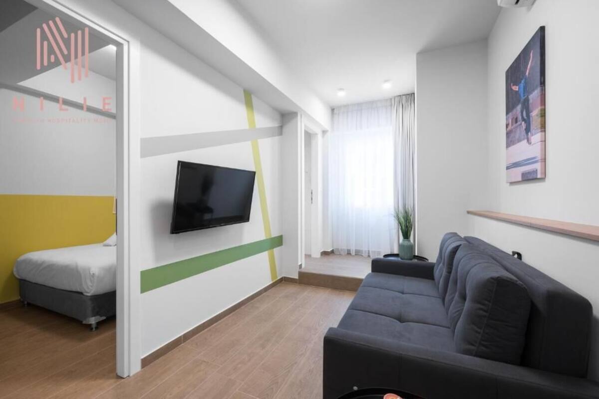 Apartamento | Zona de estar | Televisión de pantalla plana de 38 pulgadas con canales por satélite