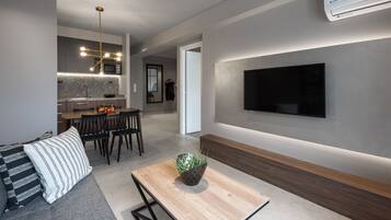 38-inch flat-screen TV with satellite channels, TV