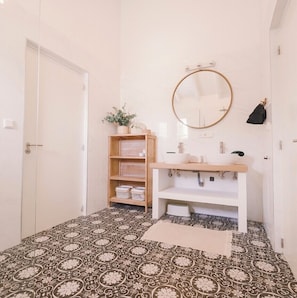 Shower, hair dryer, towels, toilet paper