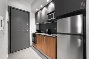 Refrigerador, horno, placa de cocina, cafetera/tetera