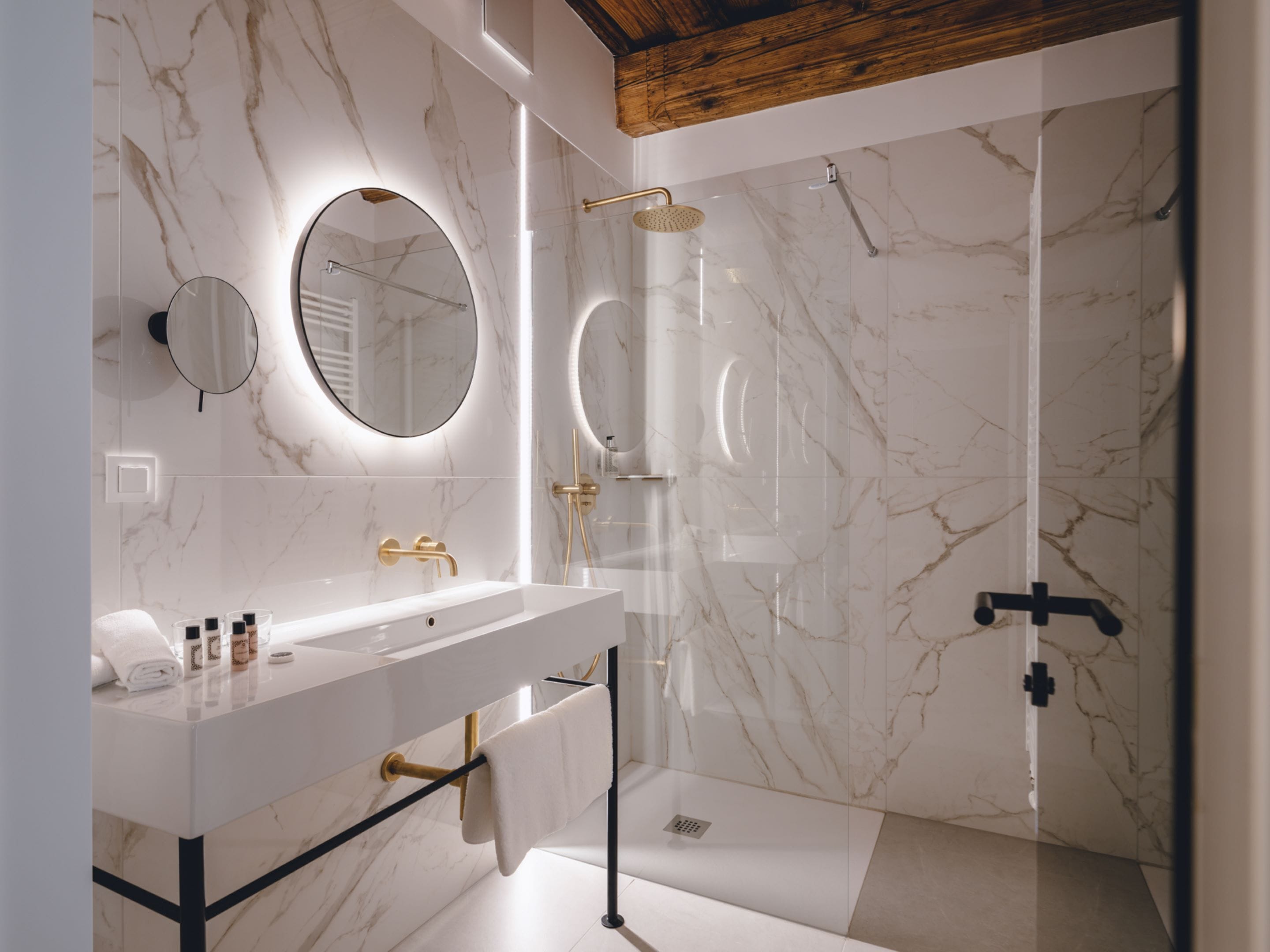 superior double room | bathroom | shower, rainfall showerhead, eco-friendly toiletries, hair dryer