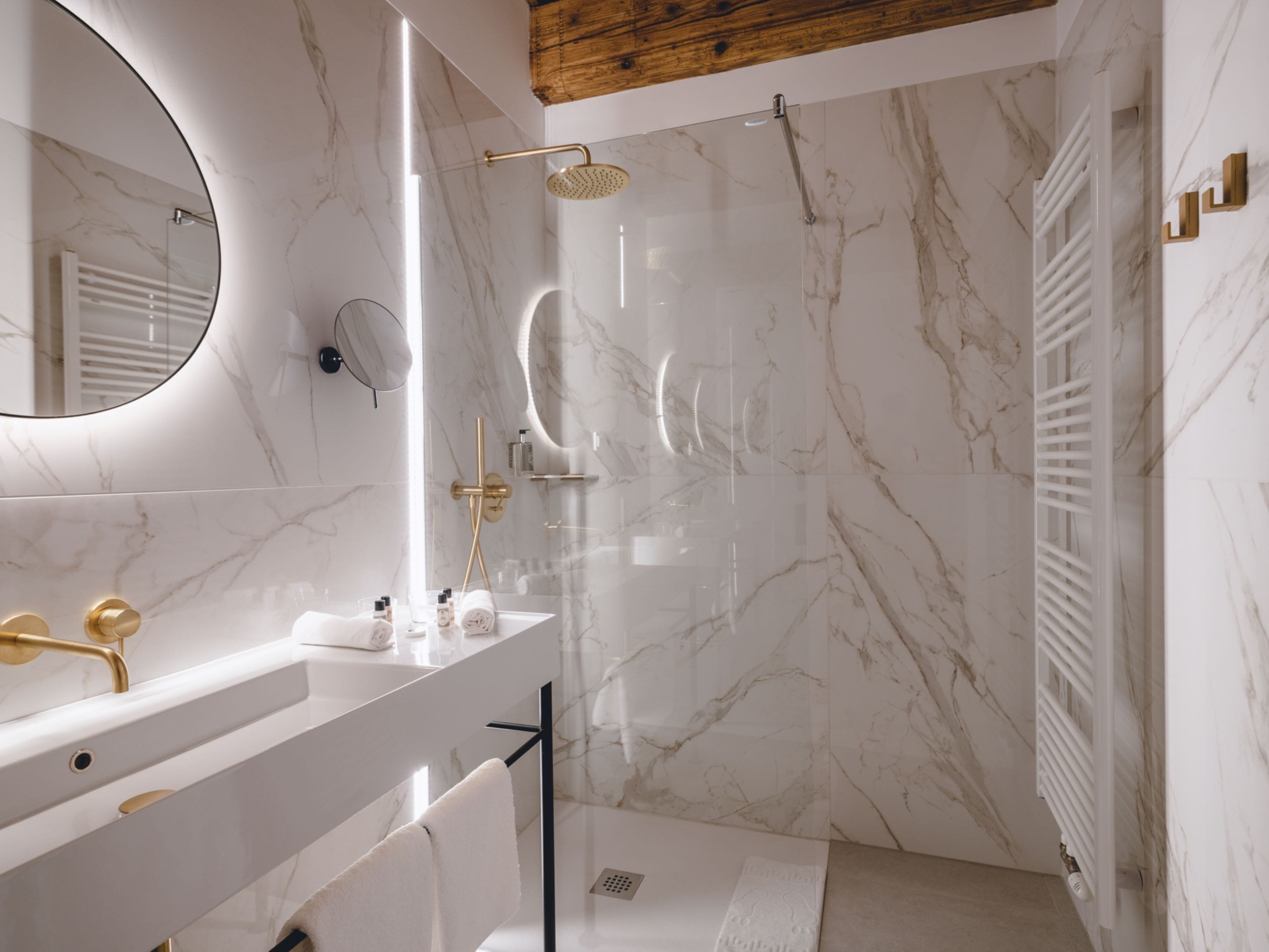 superior double room | bathroom | shower, rainfall showerhead, eco-friendly toiletries, hair dryer