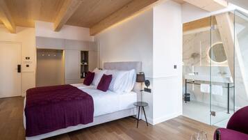 Hypo-allergenic bedding, down comforters, memory foam beds, minibar