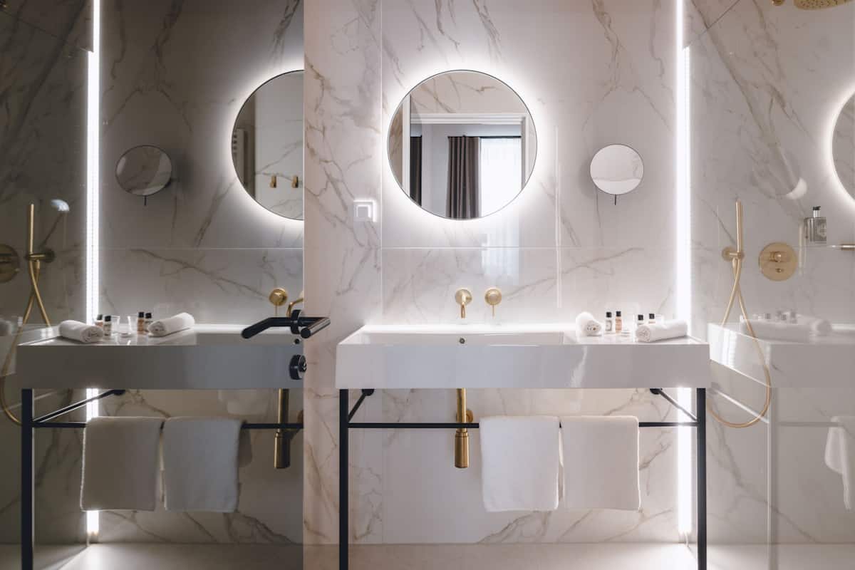 superior double room | bathroom | shower, rainfall showerhead, eco-friendly toiletries, hair dryer