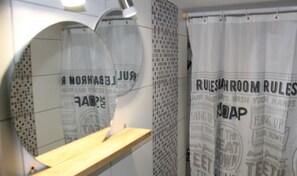 Combined shower/bathtub, hair dryer, towels, soap