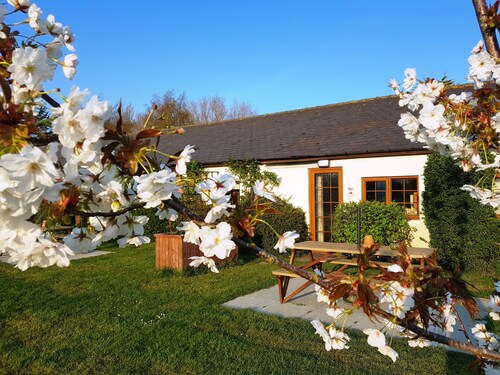 Pretty holiday cottage at Hawthorn Farm with lovely views of the donkey paddocks