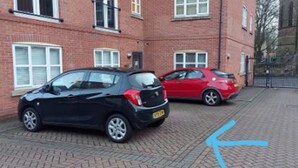 A brick building with two cars parked in front. - Sublime Stays Parliament 2-bed Apartment (Derby)