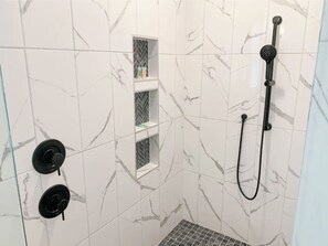 Combined shower/tub, hair dryer, towels, soap