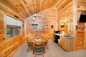 Dining - 1/2 of a double cabin with two queen beds (sleeps 4). (Flintstone)