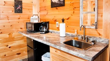 Fridge, microwave, coffee/tea maker, dining tables