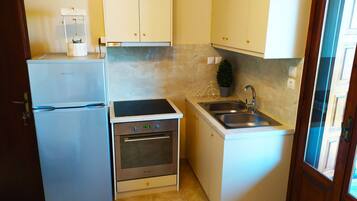 Deluxe Apartment, 2 Bedrooms, Balcony, Sea View (Number 2) | Private kitchen | Oven, stovetop, coffee/tea maker, electric kettle