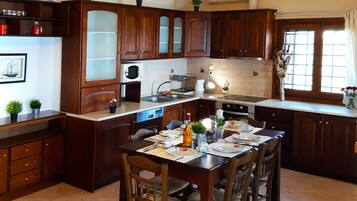 Deluxe Apartment, 3 Bedrooms, Balcony, Sea View (Number 1) | Private kitchen | Oven, stovetop, coffee/tea maker, electric kettle