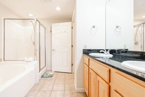 Shower, jetted tub, towels