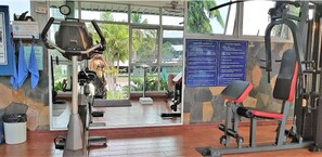 Stay fit on the go with our fully equipped gym featuring a stationary bike, rowing machine, and bench press.