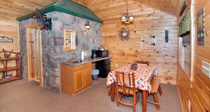 The double cabin has 2 queen beds, 1 king bed, 1 sleep sofa for 1 child. Cabin has common porch and each unit has a private entrance.